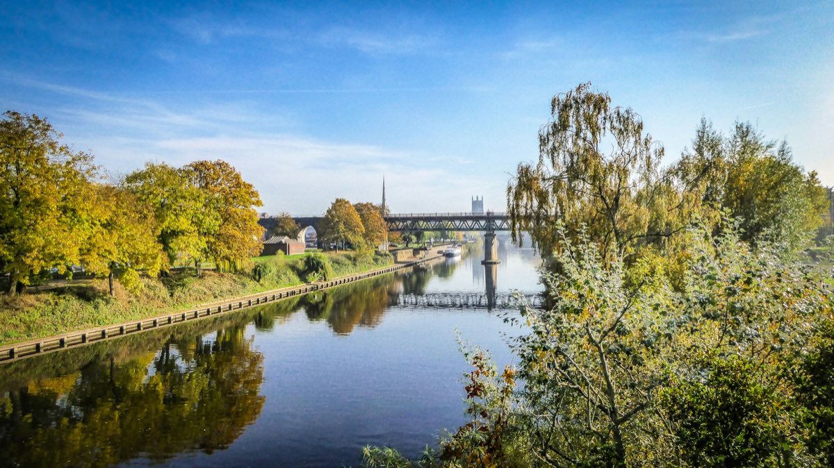 The River Severn at Worcester seen from Sabrina Bridge, with riverside trees in autumn colour